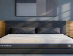 Modern bedroom with a memory foam mattress, gray upholstered bed, and geometric wall art.