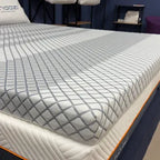 Modern memory foam mattress with geometric patterned cover on display in showroom